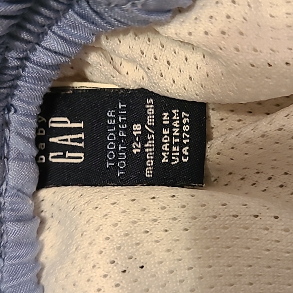 Brown zebra print mesh lined swim trunks - Picture 3 of 5